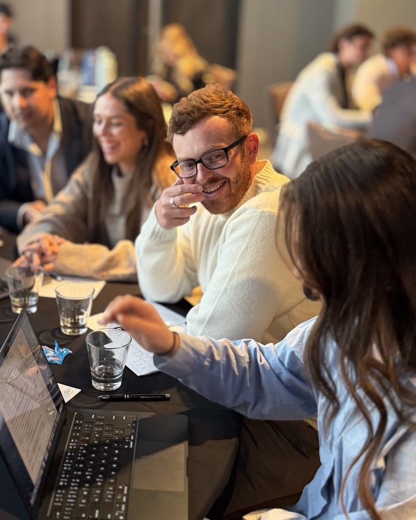 Team members working together at a training session